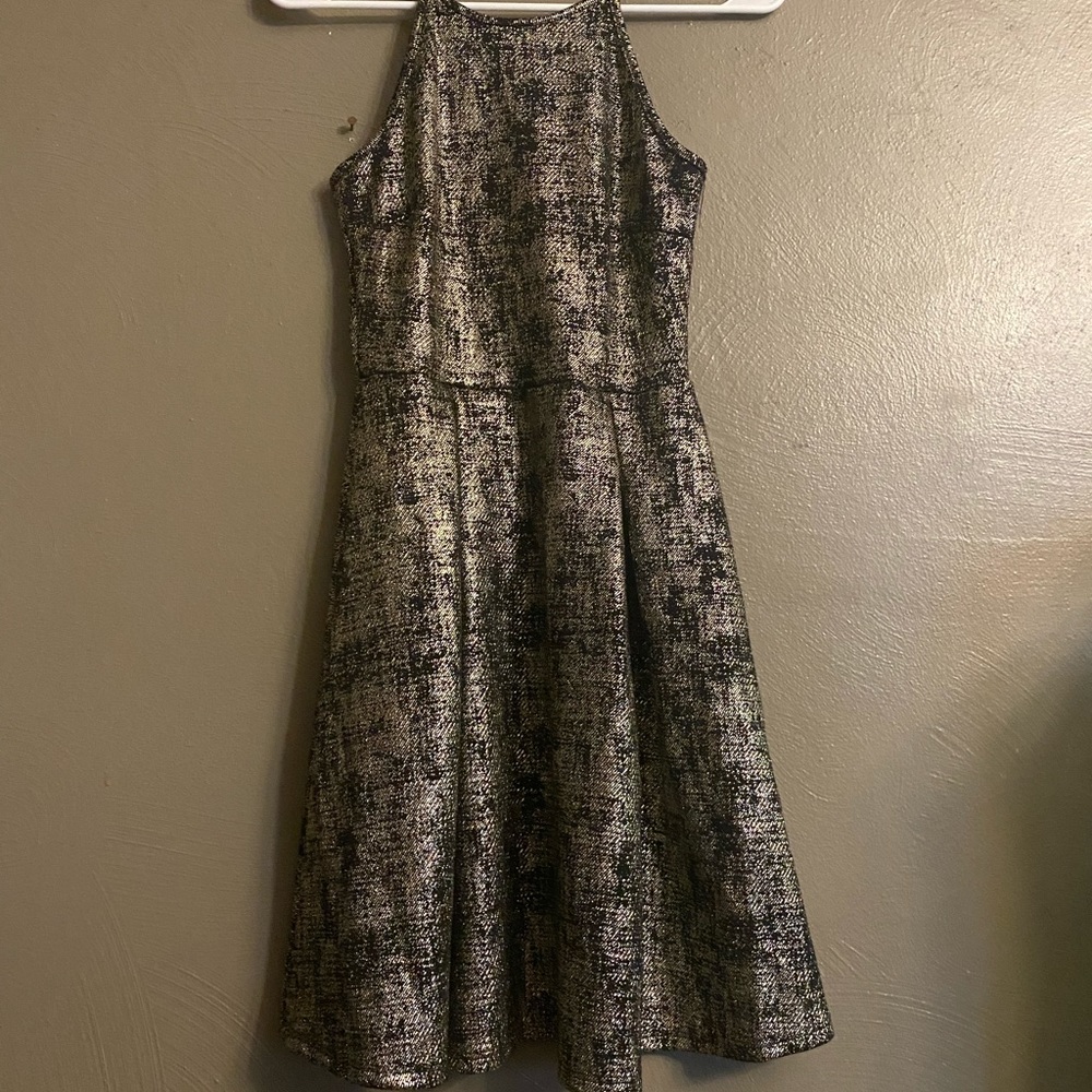 Woman’s black and gold soprano formal small dress